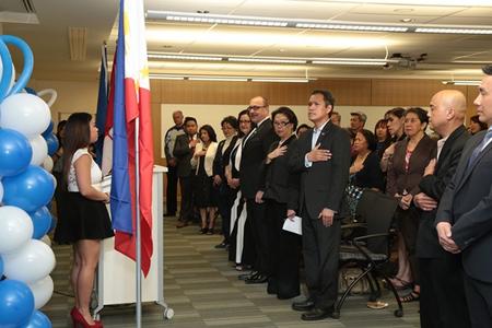 In the center, front row, Ambassador Garcia sings the Philippine National Anthem with Alberta government officials and the Filipino community in Calgary.(vancouverpcg.org)