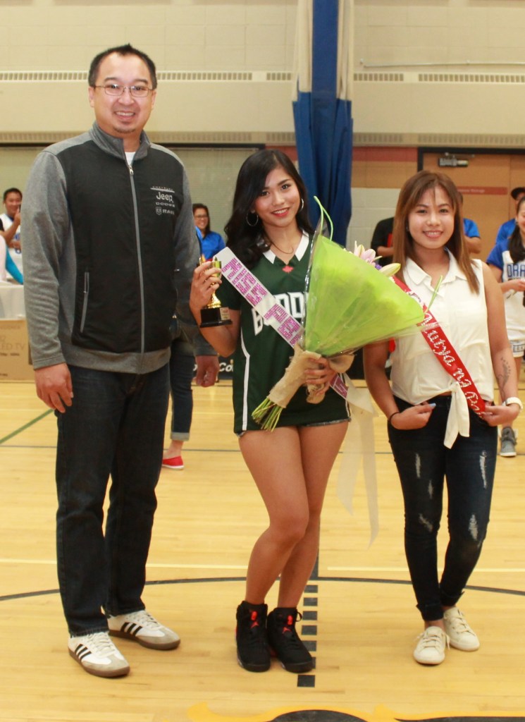 Crosstown Auto Centre's Chester Tiongson with muse of the league winner Micaela Cortez of Slave Lake.(pinoy edmonton news)