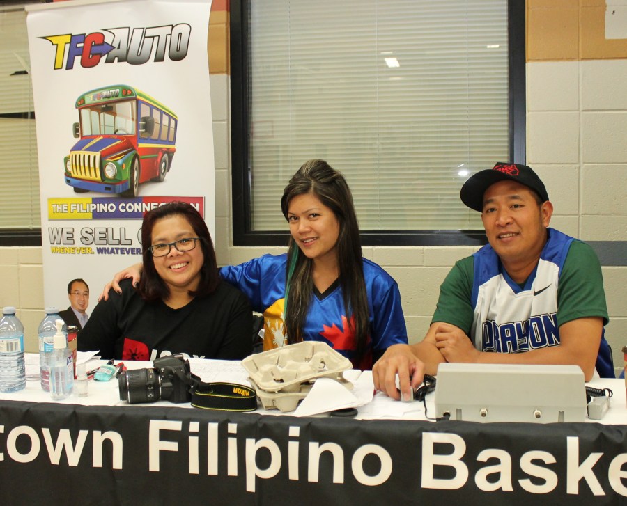 Committee members (left to right) Aileen Gabito, Randeza Cagalitan and Gravides in a light moment during the break of running the games.(pinoy edmonton news)