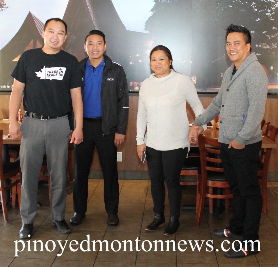 Representatives of the Benzon family, Ana Leah and Ruel (holding hands), with Edwin Arciaga and regular customer Chester Tiongson (extreme left).(Photo by Moses Billacura/pinoy edmonton news)