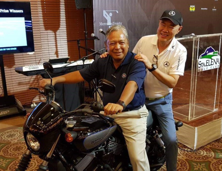 PAL golf JJB rides a Harley